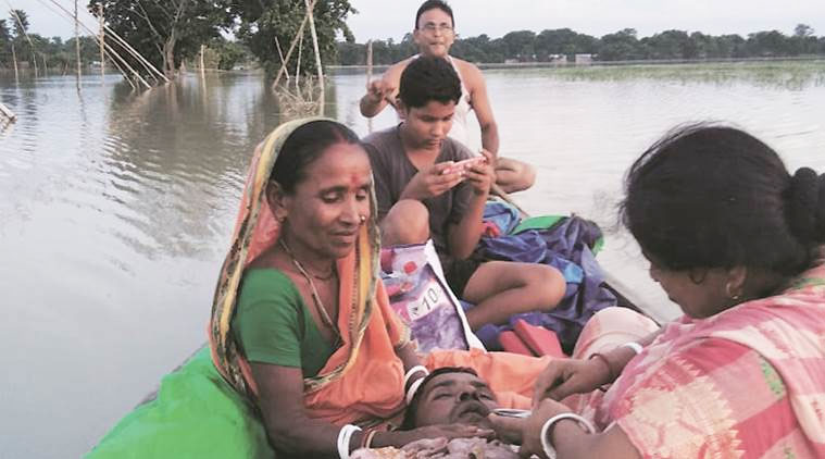 Stuck in Morigaon amid floods: How a boat, a video call helped connect Delhi doc to Assam patient
